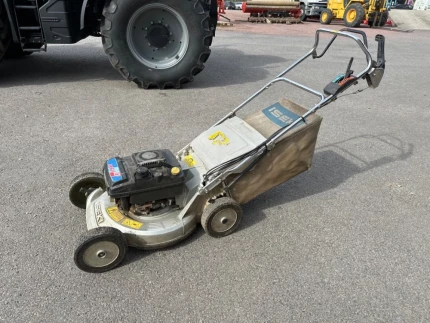 Tondeuse à conducteur marchant - 2009